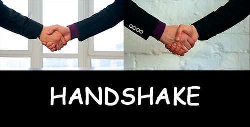 Business People Handshake in Front of White Backdrop