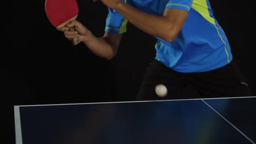 Young Man Playing Table Tennis