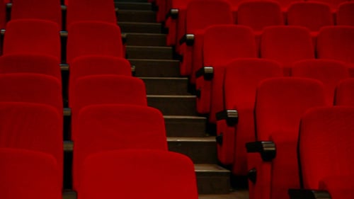 Empty Auditorium - Red Chairs In Rows