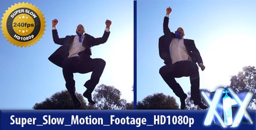 Enthusiastic Man Jumping in Suit Against Blue Sky