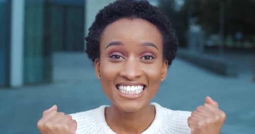 Cheerful Darkskinned Girl Afro Woman Smiling Rejoicing Win Standing Isolated Outdoors Celebrate