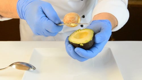 Peeling and cutting a Avocado Fruit