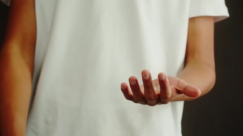 Person Sanitizing Hands with Hand Sanitizer