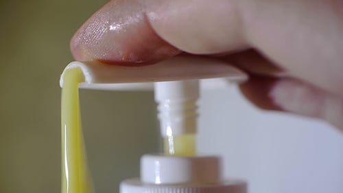 Liquid Soap Dispenser Pumping Out Soap Close Up