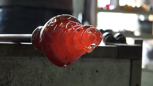 Red Hot Glass Being Shaped on a Rod