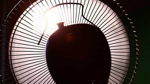 Rotating Fan in Silhouette with Bright Backlight