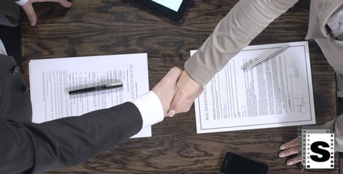 Real Estate Deal is Sealed with Handshake