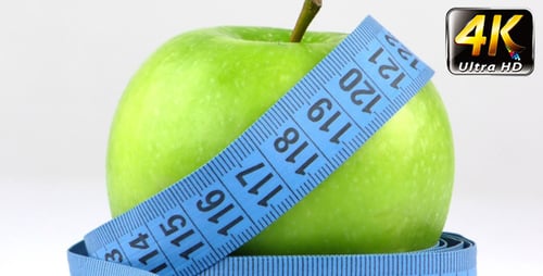 Green Apple Wrapped with Measuring Tape