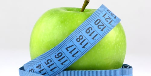Green Apple and Measuring Tape for Health