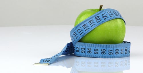 Apple Wrapped with Measuring Tape for Healthy Eating