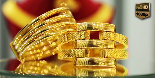 Elegant Gold Bracelets on Display