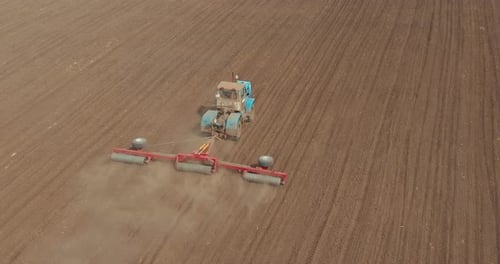 Tillage and Plowing Soil By Tractor Aerial View of Agricultural Field in Seeding Season Prores