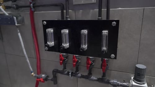 Close Up of Industrial Pipes and Meters