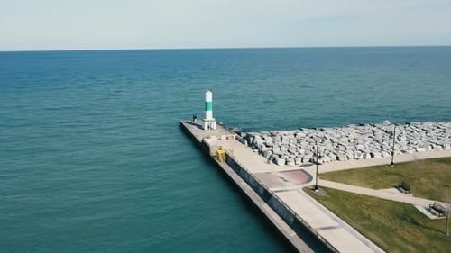 Aerial Flight Over the Shoreline with Lighthouses