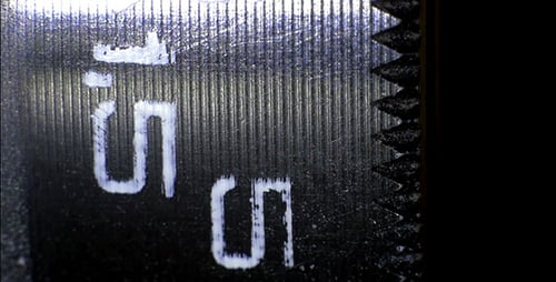 Extreme Close Up of Grey Metallic Circuit Board