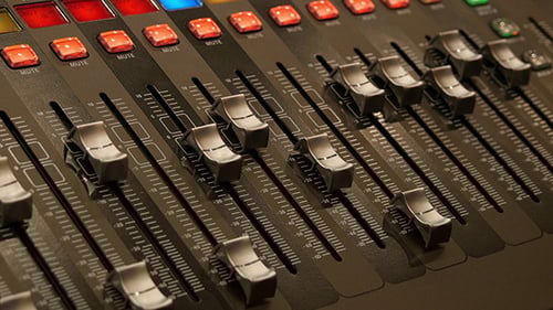 Audio Mixing Console Close Up Faders and Buttons