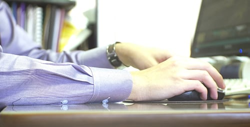 Office Worker Works With Computer