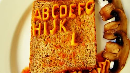Alphabet Spaghetti Spelling Letters on Toast with Mushrooms