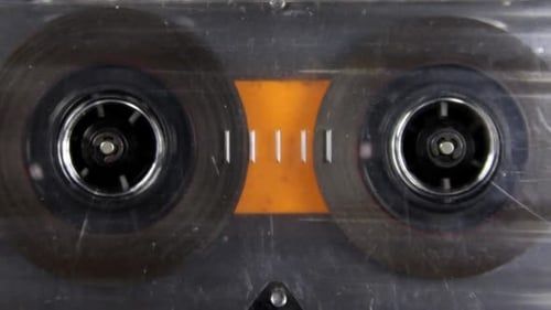 Spinning Cassette Tapes Reels Background