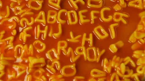 Letter Shaped Pasta in Tomato Sauce Close Up
