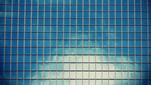 Clouds Reflecting On Office Building Windows - 3