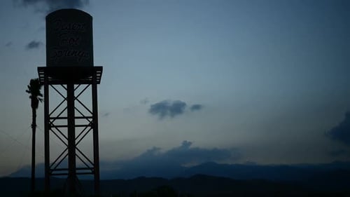 Water Tower At Sunset