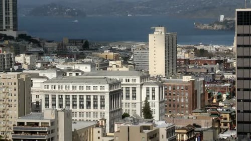 City Skyline And Bay With Clouds - Time Lapse