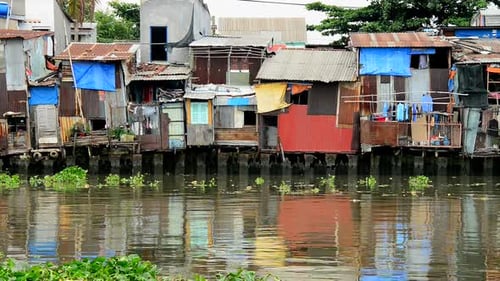 Zoom Out Of Shacks On The Saigon River - Ho Chi Minh City (Saigon) -