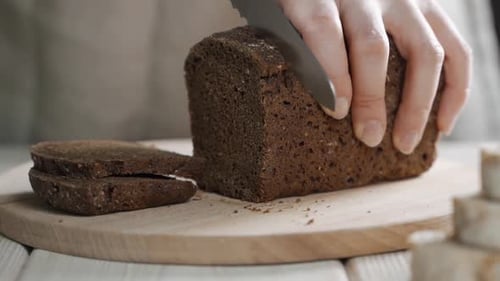 Slicing Brown Bread Macro Shot, Cooking Toasted Bread, Slow Motion