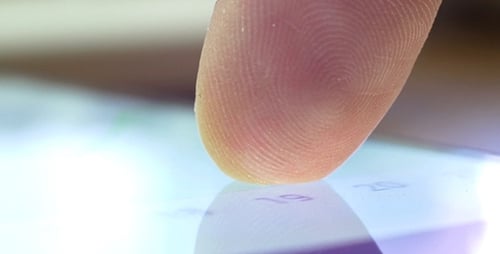 Finger Interacting with Touchscreen Device