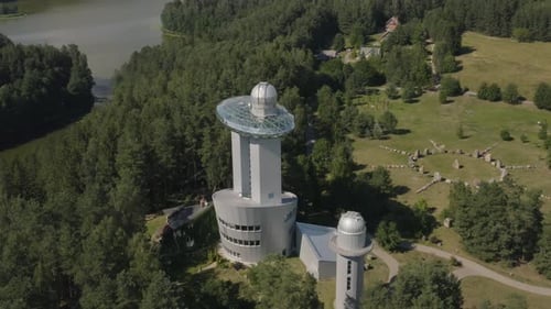 Orbiting Modern Glassy Observatory Dome Surrounded by Beautiful Park