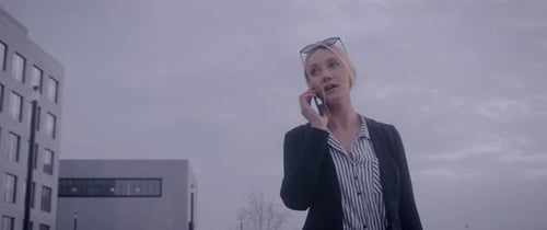 Business Woman Talking on Phone in Urban Setting