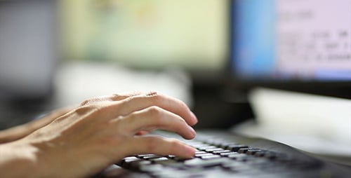 Woman Working at a Computer 23