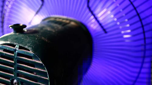 Extreme Close Up of a Purple Spinning Fan