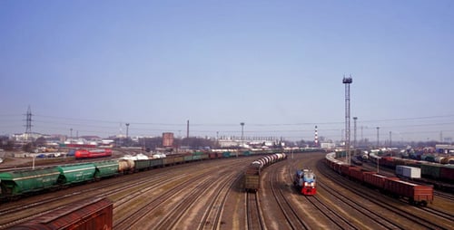 Train and Train Cars in Rail Yard