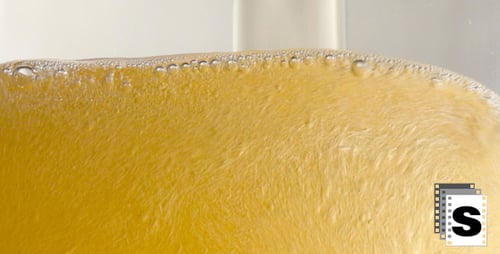 Pouring Golden Beer Close Up