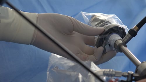 Surgical Tool Being Held in Hospital Room