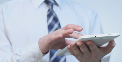 Businessman Using Touchpad in the Office