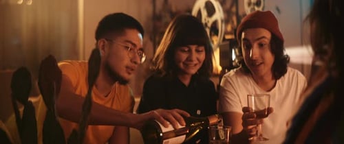 Young Adults Celebrating Together Indoors