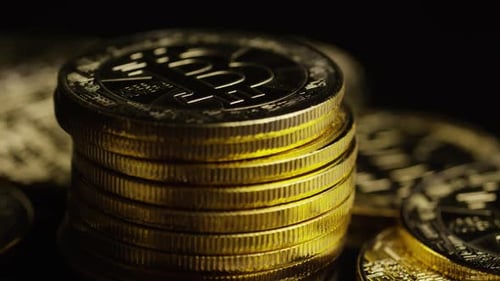 Rotating shot of Bitcoins (digital cryptocurrency) - BITCOIN 0630