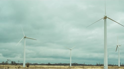 Wind Turbines Rotating in a Rural Landscape