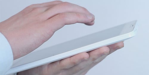 Hand Using Tablet Touchscreen
