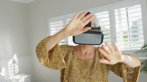 Senior Woman Enjoys Virtual Reality Headset Experience