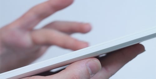 Hands Touching White Tablet Device