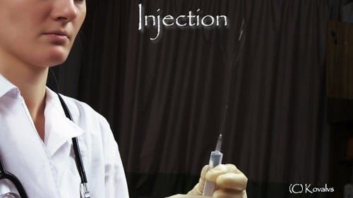 Medical Professional Prepares Syringe for Injection
