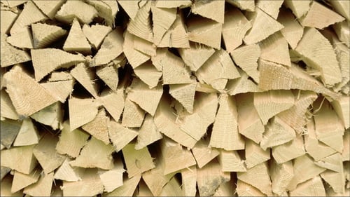 Lots of Firewoods Stacked to be Delivered