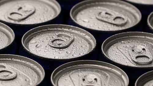 Close Up of Silver Aluminum Cans with Condensation