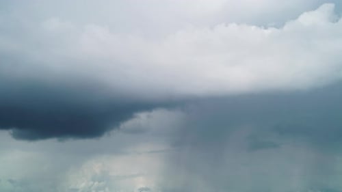 Dramatic Clouds Billowing in the Gray Sky