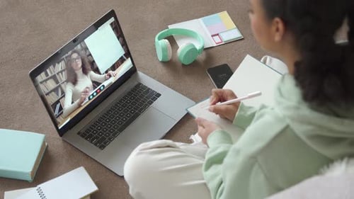 Student Attends Online Class and Takes Notes
