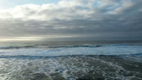 Stormy weather by the sea in Portugal. Huge waves crashing down the coast of Portugal